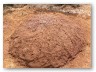 This pile took 4 of us 3 hours in all, to turn from soil into a dough. It will make 40 bricks .And, we needed 2,000