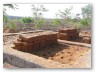 We began stacking bricks close to be at hand for the masonry team