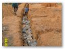 The trench depth turned out excessive and called for a lot of rocks
