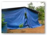 Rains at night again and tarps came on.