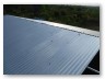 After the rain break: Half mm. corrugated galvanised iron sheets were laid on 50mm steel pipes.